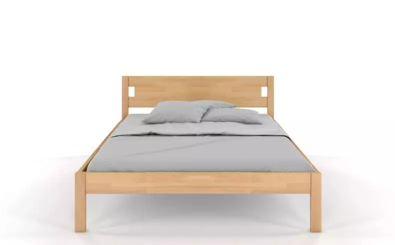Łóżko drewniane na wysokich nóżkach